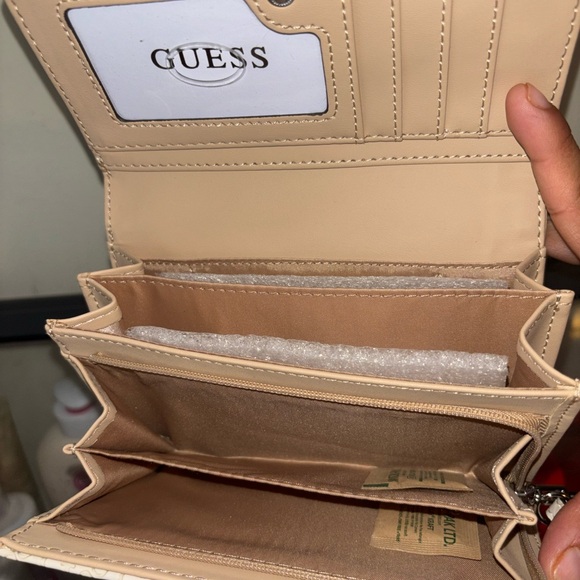 GUESS Cream Logo-Embossed Wristlet Wallet - Picture 7 of 10